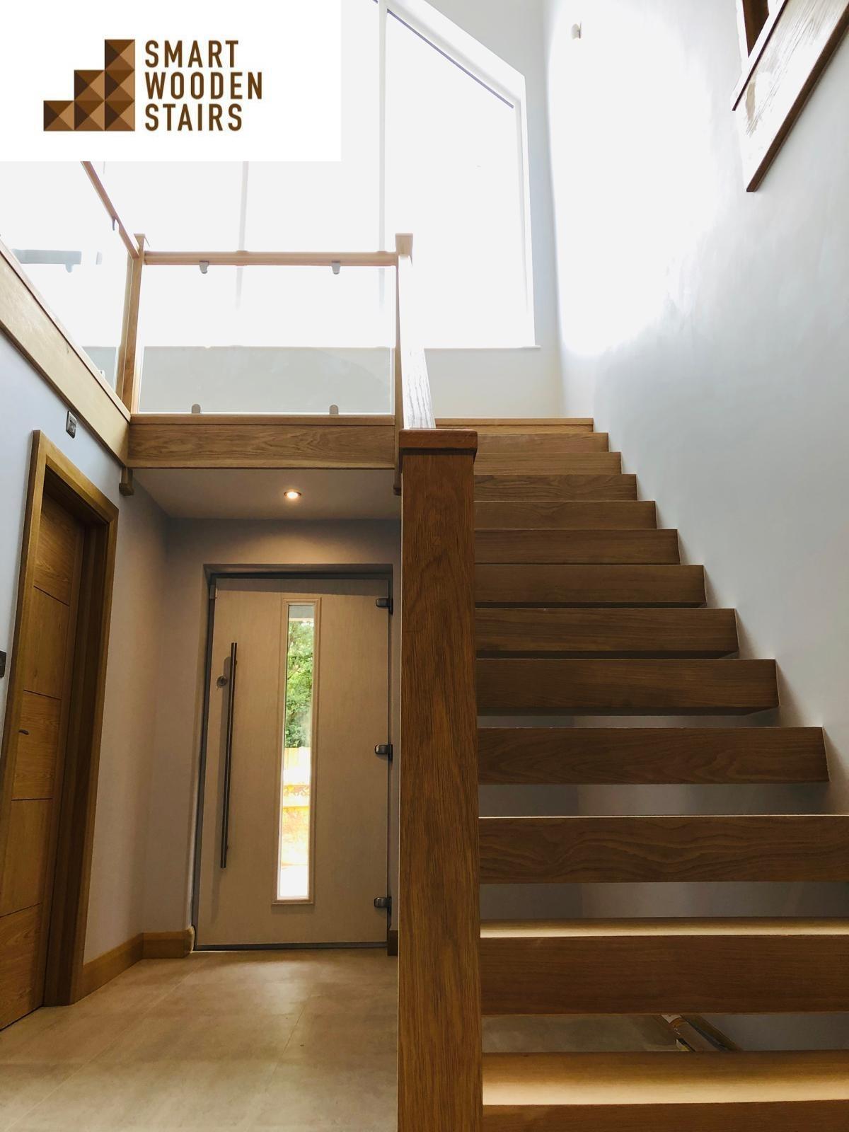 Oak floating staircase with Glass