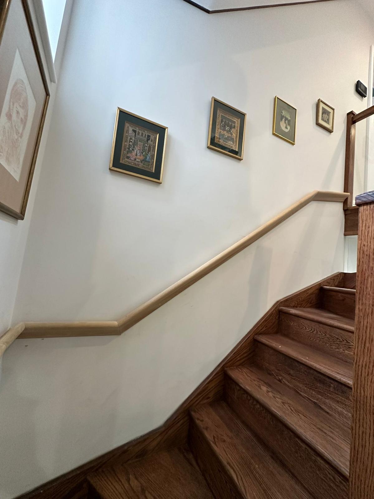 Oak staircase with wall handrail